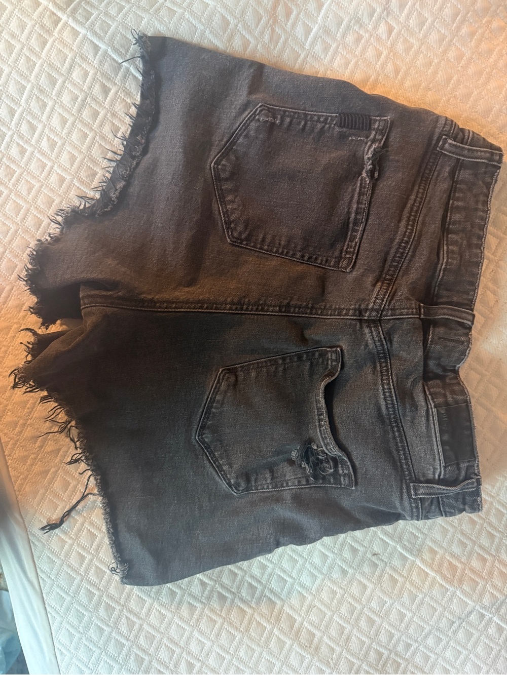 PAIGE Washed Black Distressed Denim Cutoff Shorts